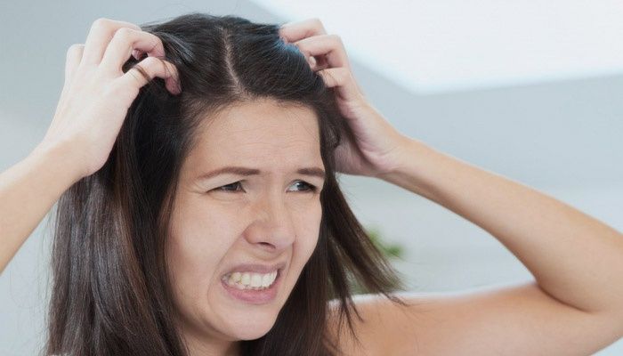 Woman has itchy scalp